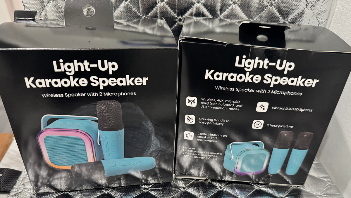 NEW - Light Up Karaoke Speaker. Comes with Two Microphones, USB charging cable.