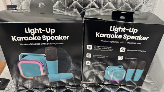 NEW - Light Up Karaoke Speaker. Comes with Two Microphones, USB charging cable.